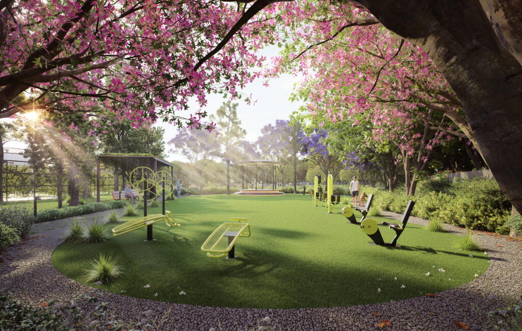 Outdoor fitness area under pink blooming trees at Codename Forest View Villa.